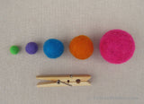 Scale picture of 1cm, 1.5cm, 2cm and 4cm wool felt balls